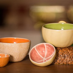 Ceramic bowls created from molds made from real fruits and vegetables.