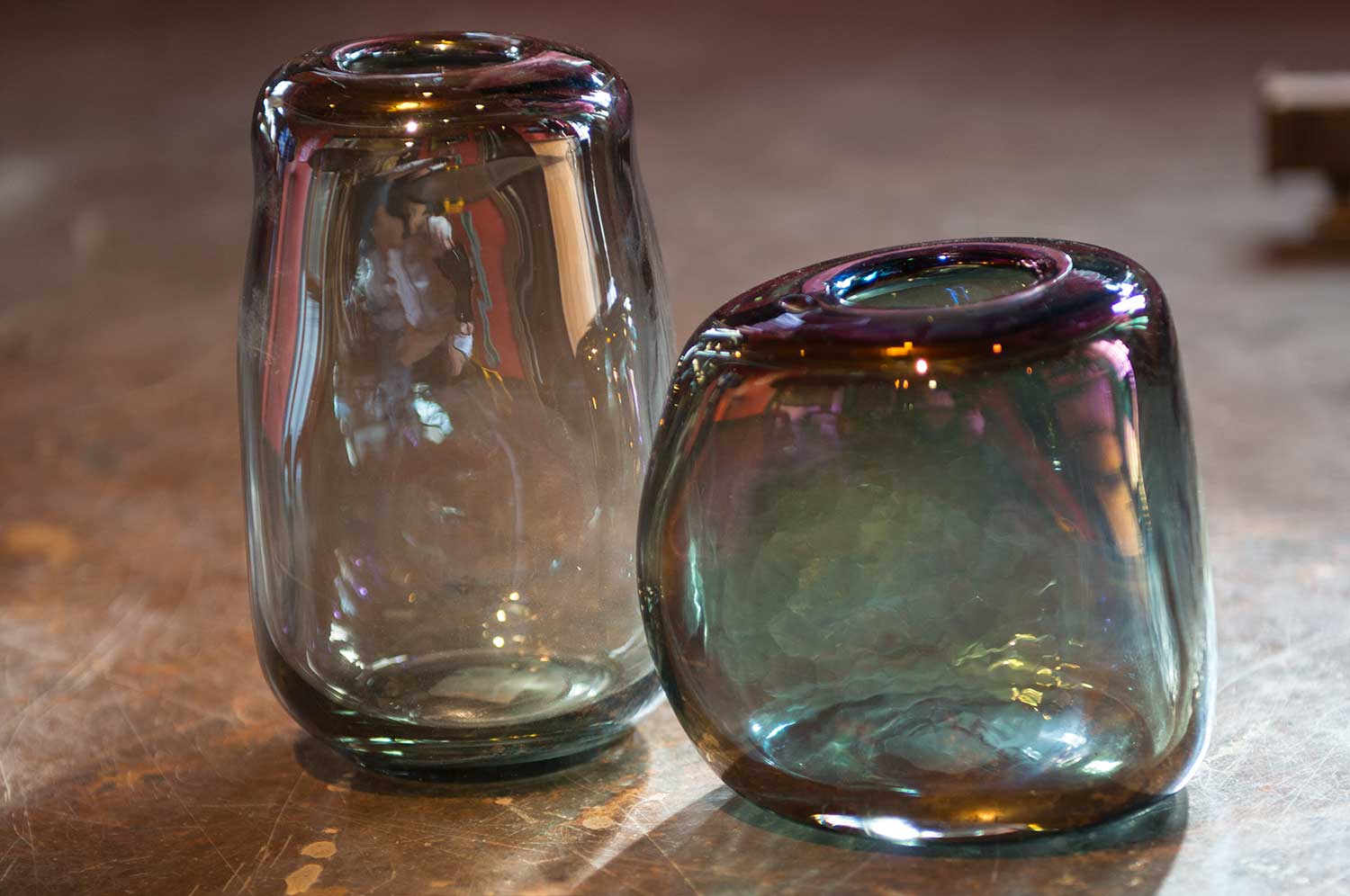 Two iridized glass vases