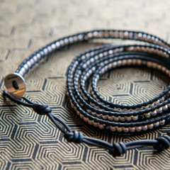 sterling silver and natural black leather wrap bracelet.